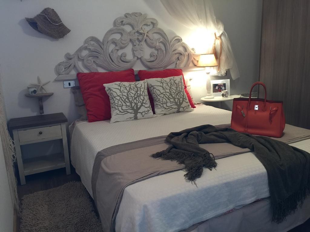 Smeralda Residenza Di Charme มาริน่า ดิ ปอร์ติสโก ห้อง รูปภาพ